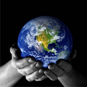 image of a globe in someone's hands