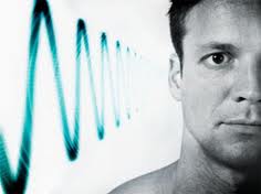 man with a subliminal sound wave going into his ear